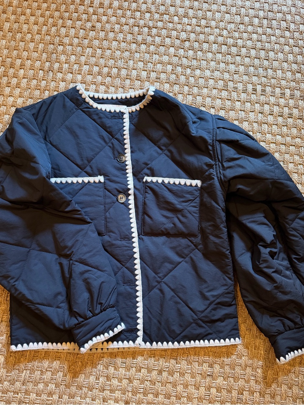 Bishop + young Women’s black Quilted Jacket with White Trim. Size xs.